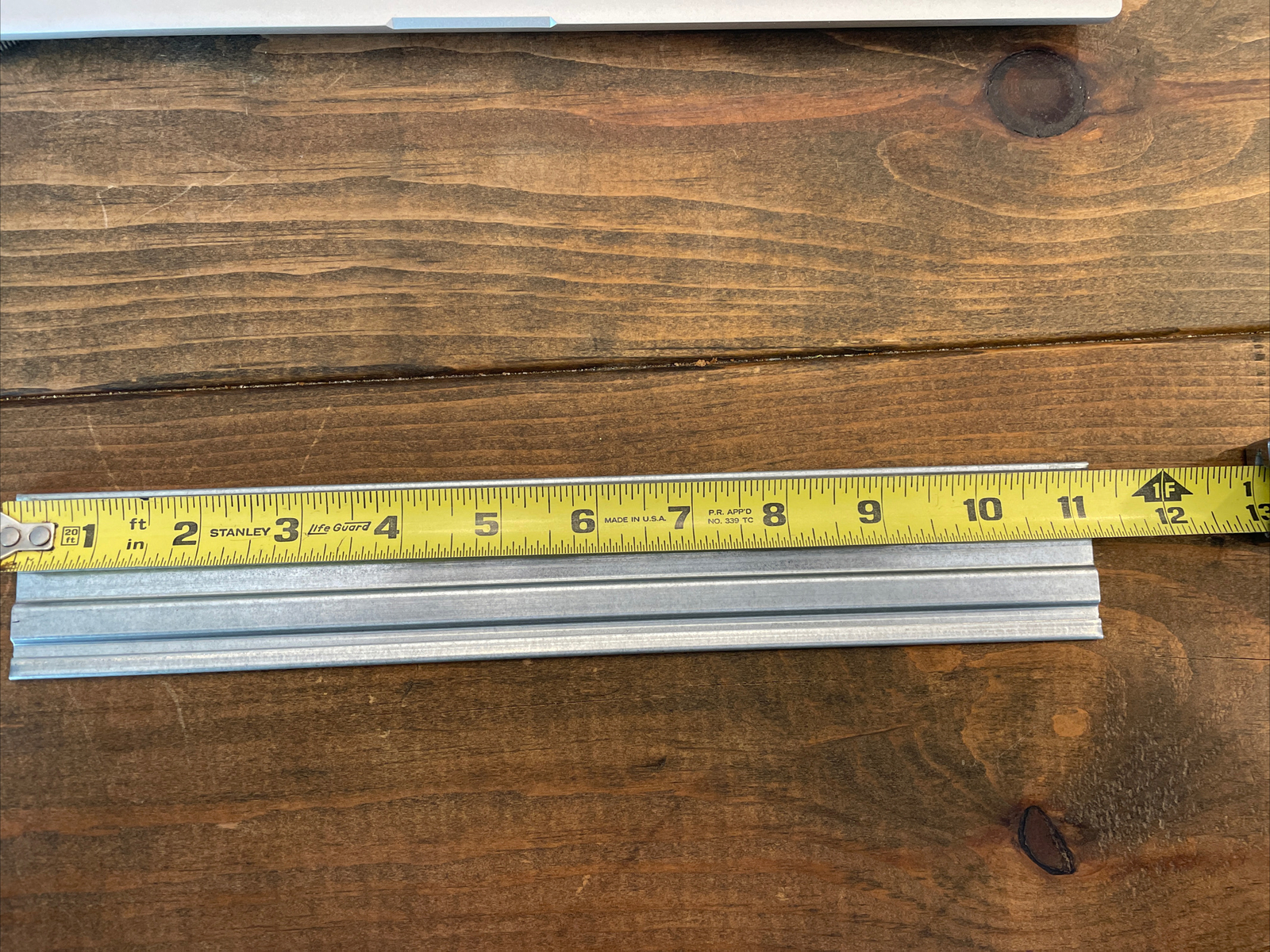 Knapheide service body metal shelf divider. 11 1/4 In. X 1 7/8 In.